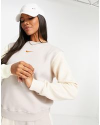 Sudadera con capucha, diseño color block en tonos y logo metalizado Nike de  color Rosa | Lyst