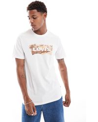 Levi's - Camiseta blanca con logo tropical en forma - Lyst