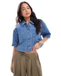 ONLY - Chemise en jean coupe carrée courte - moyen délavé - Lyst