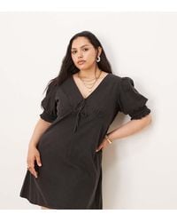 ASOS - Vestido Vaquero Corto Lavado Con Mangas Abullonadas Y Detalle De Volantes De Denim Suave De Asos Design Curve - Lyst