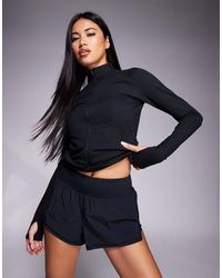 4505 - Running 2-in-1 High Waist Jersey Shorts With Phone Pocket - Lyst
