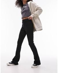 TOPSHOP - Pantaloni A Zampa Skinny Neri A Coste - Lyst