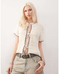 Reclaimed (vintage) - – vorne gebundene, kurzärmlige jacke aus häkelstrick - Lyst
