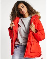 The Couture Club Jas Met Capuchon En Rand Van Imitatiebont - Rood