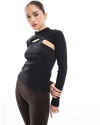 PUMA - Dare To Midnight Motion Long Sleeve Top - Lyst