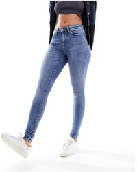 ONLY - Jeans skinny push up azzurri - Lyst