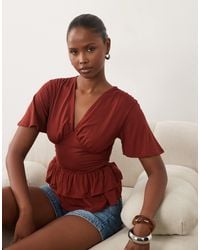 ASOS - V Neck Top With Ruffle Peplum Hem - Lyst