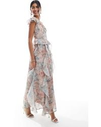 Vero Moda - Robe longue asymétrique en mousseline à volants - imprimé fleuri délavé - Lyst