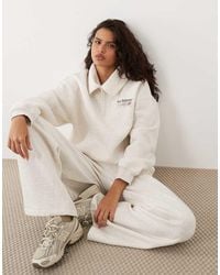 New Balance - Trackside Fleece Half Zip Sweatshirt - Lyst