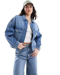 Bershka - Giacca di jeans oversize lavaggio medio - Lyst