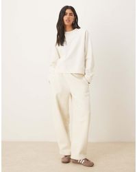 ASOS - Brushback Joggingbroek Met Wijde Ronde Pijpen - Lyst