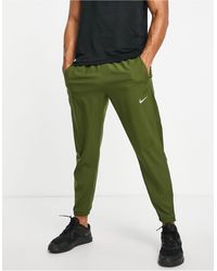 nike dri fit challenger pants