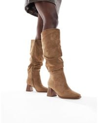 SEQWL - – fisher – locker sitzende, kniehohe stiefel - Lyst