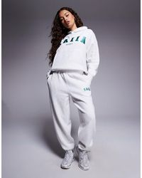 Kaiia - Petite Cotton Rich Sport Embroidered Logo Cuffed Trackies - Lyst