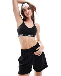 Nike - Sujetador Deportivo De Sujeción Media Dri-Fit Indy De - Lyst