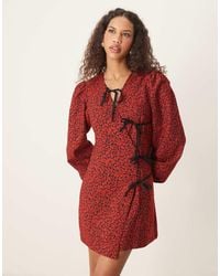 Ghospell - Bow Detail Wrap Mini Dress - Lyst