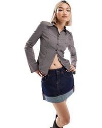 Bershka - Mini-jupe en jean à ourlet à revers - authentique - Lyst