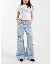 Levi's - Losse Bootcut Jeans Met Scheuren - Lyst