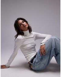TOPSHOP - Premium Rib Long Sleeve Funnel Neck Top - Lyst