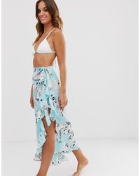 UNIQUE21 – Asymmetrischer Sarong mit blauem Tropenmuster