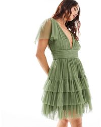 LACE & BEADS - L'invitée - madison - robe courte en tulle à décolleté v - olive - Lyst