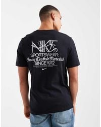 Nike - Camiseta Negra Con Estampado Gráfico Trasero De Sportswear - Lyst