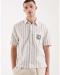Hollister - Gestreept Overhemd Van Linnenmix Met Korte Mouwen En Grafische Print Op De Borst - Lyst