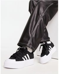 adidas Originals - Nizza - sneakers nere e bianche con suola platform - Lyst