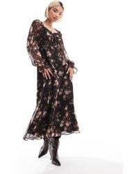 Miss Selfridge - – korsett-maxikleid aus chiffon mit blumenmuster - Lyst