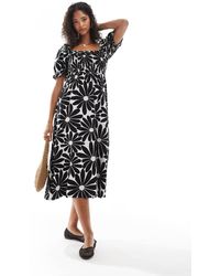 New Look - Vestito Milkmaid Nero A Fiori Con Maniche A Sbuffo - Lyst