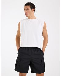 4505 - Crinkle Nylon 7" Cargo Training Short With Zip Pockets - Lyst