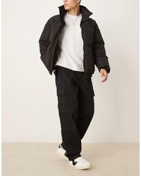 Calvin Klein - Pantaloni Cargo Dritti Neri - Lyst