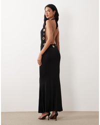 Murci - – anschmiegsames neckholder-maxikleid - Lyst