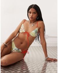 Reclaimed (vintage) - – bikinioberteil mit dünnen kontrastträgern und lucky-holiday-print - Lyst