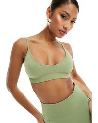 ASOS 4505 - Seamless Double Rib Light Support Sports Bra With Removable Padding - Lyst