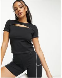 Nike - Sport - t-shirt nera a maniche corte con apertura a goccia - Lyst