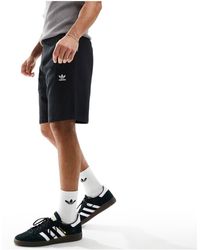 adidas Originals - Trefoil essentials - pantaloncini neri con logo - Lyst