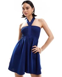 esmé studios - Esmee Exclusive Halter Shirred Top Mini Beach Dress - Lyst
