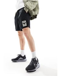 Nike - Training Studio 72 Dri-fit Unlimited Ultra-light Woven 7-inch Shorts - Lyst