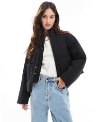 ASOS - Chaqueta Negra Acolchada Extragrande Con Cuello Alzado De - Lyst
