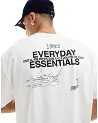 ASOS - T-shirt oversize bianca con scritta stampata sul retro - Lyst