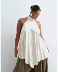ARRANGE - Curve Longline Halter Hanky Hem Top - Lyst