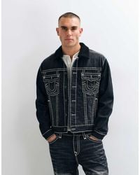 TRUE RELIGION - Oversized Fit Embossed Logo Denim Trucker Jacket Co-ord - Lyst