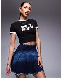 Courtside - Pleated Denim Mini Skirt With Stone Wash Detail - Lyst