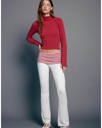 Stradivarius - Turn-down Waist Bell Bottom leggings - Lyst