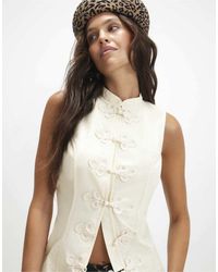 River Island - Sleeveless Stand Up Collar Drummer Top - Lyst