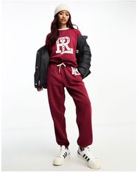 Polo Ralph Lauren - Joggers rossi con logo stile college - Lyst
