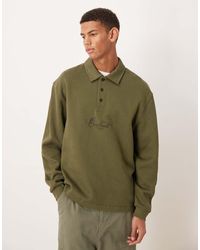 ASOS - Geribbeld Polo Sweatshirt Met Tekstprint En Geweven Label - Lyst