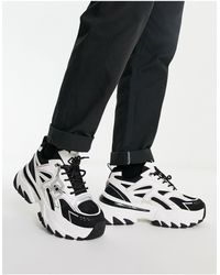 ASOS - Chunky sneakers bianche e neri con pannelli metallizzati - Lyst