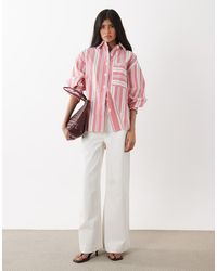 Ghospell - Scout Cotton Collar Button Placket Long Sleeve Shirt With Bow Back Detail - Lyst